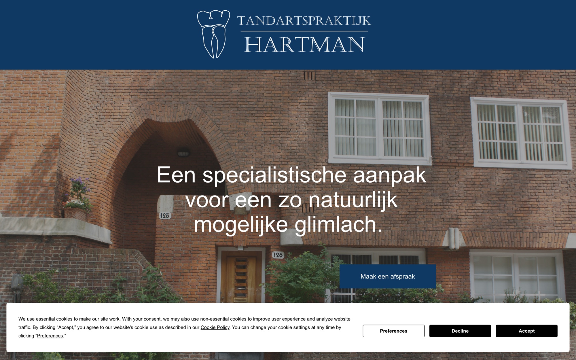 The practice's current homepage with an English cookie banner